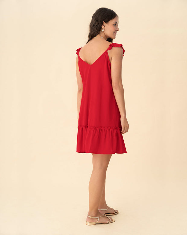 Vestido corto con bolero en mangas y ruedo