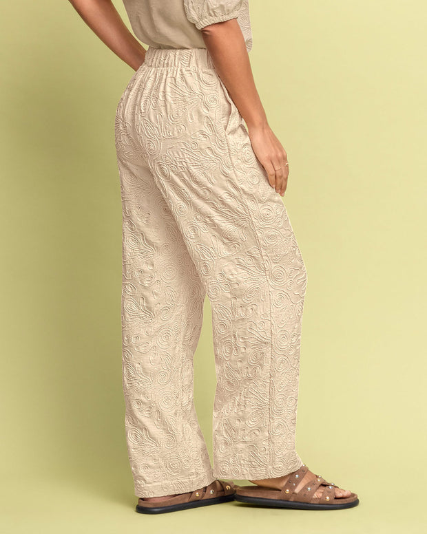 Pantalón bota recta en tela bordada