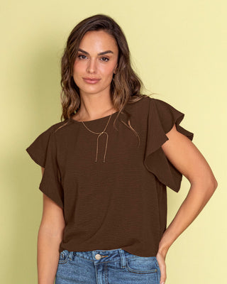 Blusa con boleros en mangas en tela craquelada#color_c23-cafe