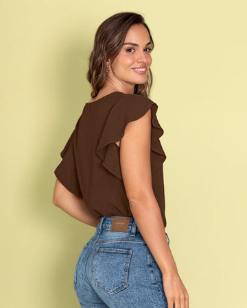 Blusa con boleros en mangas en tela craquelada#color_c23-cafe