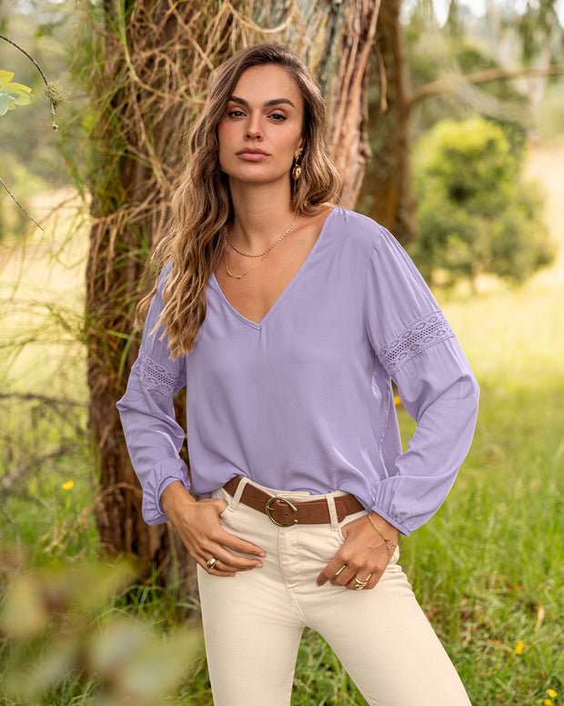 Blusa con detalle tipo encaje en mangas