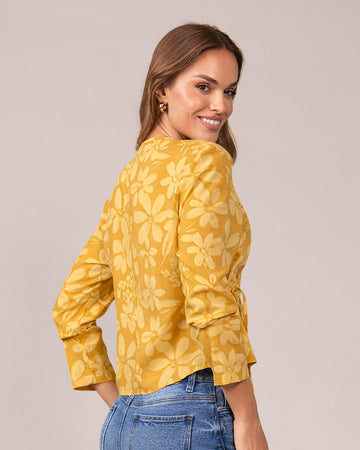 Blusa manga larga de diseño cruzado en frente#color_100-flores-amarillas