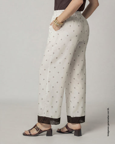 Pantalón largo amplio con detalle tejido en bota#color_001-blanco-estampado