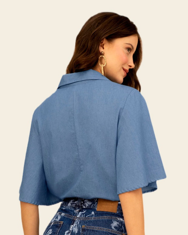 Camisa manga corta amplia con botones funcionales