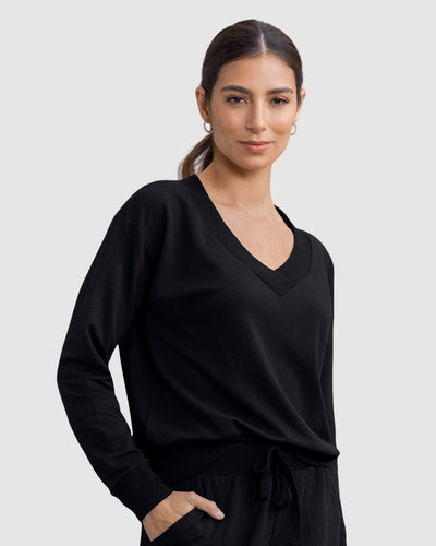 Buzo manga larga de hombro rodado#color_700-negro