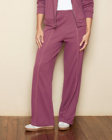Pantalón bota recta con elástico en cintura y costuras decorativas#color_337-morado-medio