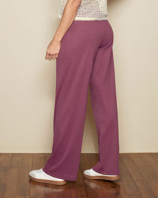 Pantalón bota recta con elástico en cintura y costuras decorativas#color_337-morado-medio