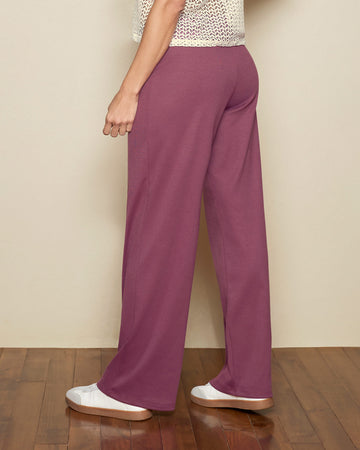 Pantalón bota recta con elástico en cintura y costuras decorativas#color_337-morado-medio