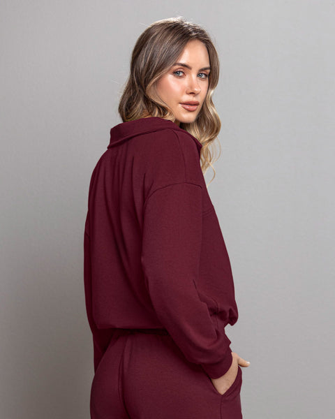 Buzo tipo polo de silueta amplia#color_c37-borgona