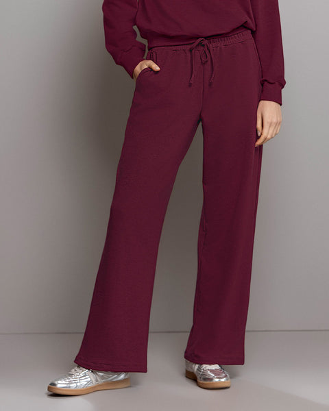 Pantalón bota amplia con elástico y tira anudable en cintura#color_c37-borgona