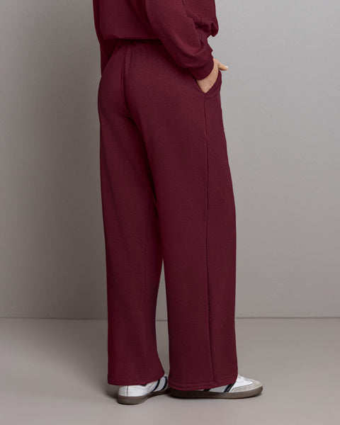 Pantalón bota amplia con elástico y tira anudable en cintura#color_c37-borgona