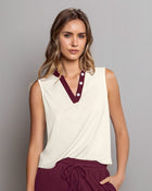 Camiseta manga sisa con escote en contraste#color_018-marfil