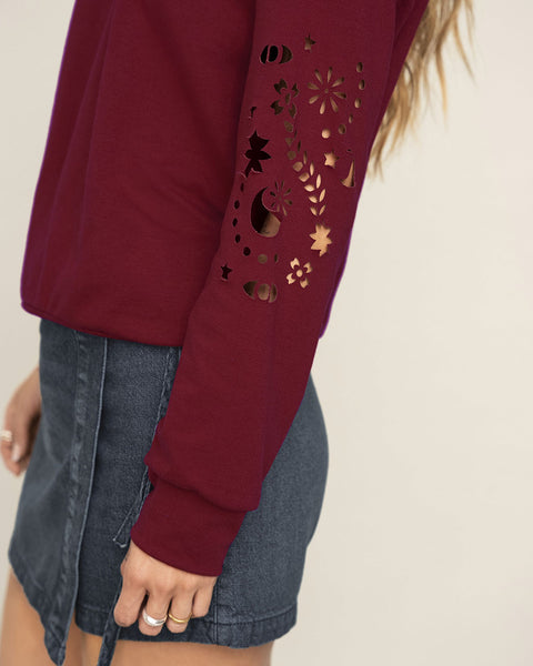 Buzo manga larga con estampado localizado de cuello redondo#color_c34-vino