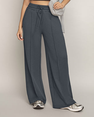 Pantalón tipo jogger con bota ancha#color_c13-gris-oscuro