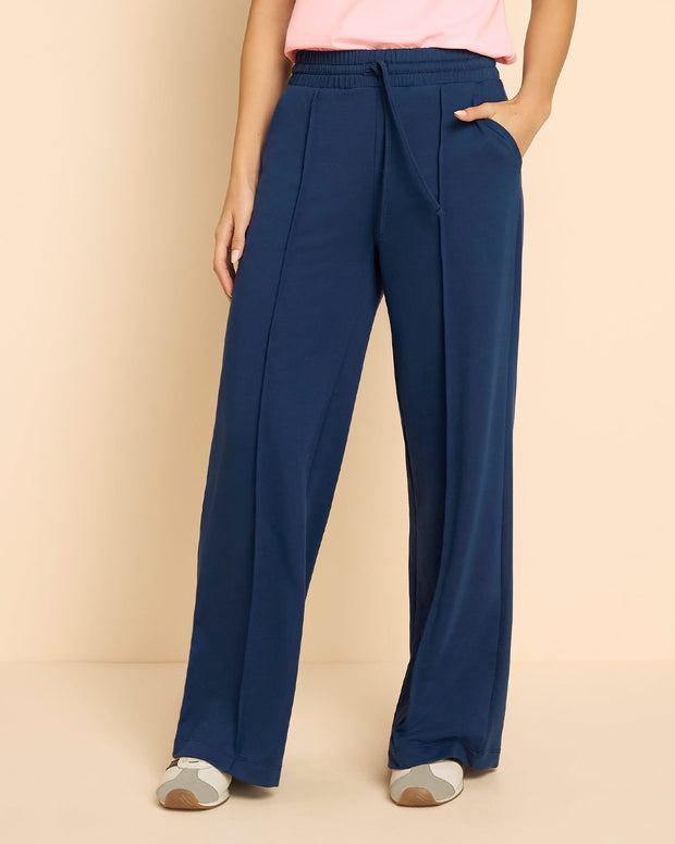 Pantalón tipo jogger con bota ancha
