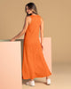 Vestido largo manga sisa con apertura en costado#color_203-naranja-claro