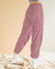 Pantalón jogger con bolsillos funcionales y elástico en cintura y ruedo#color_180-palo-de-rosa