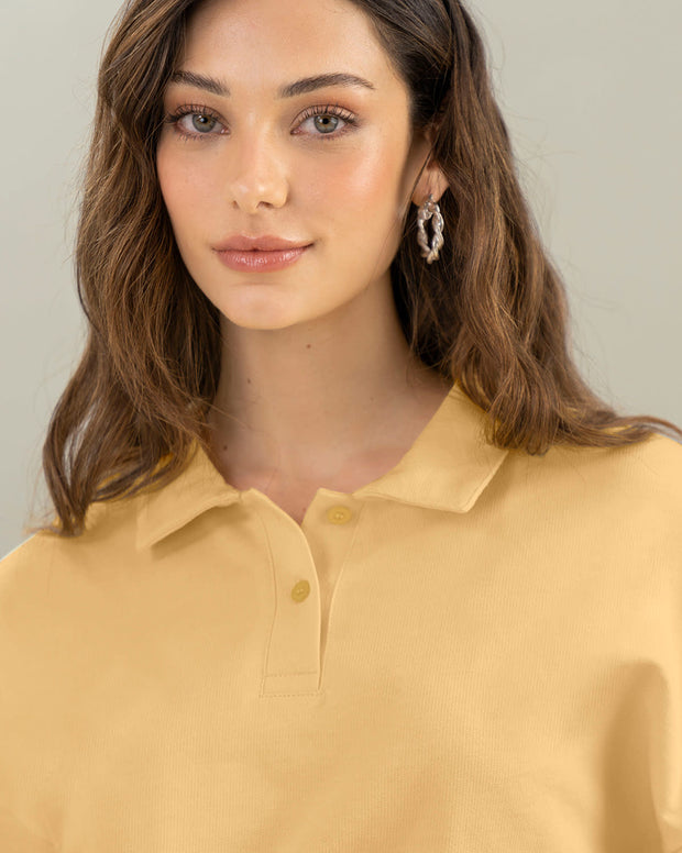 Camiseta manga larga tipo polo para mujer