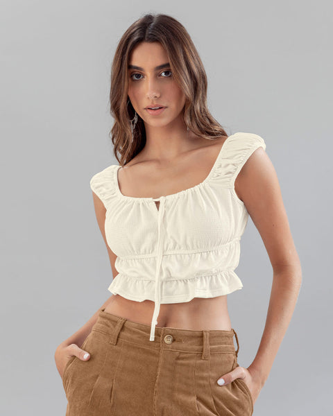 Blusa crop top con tiras para anudar en escote#color_018-marfil