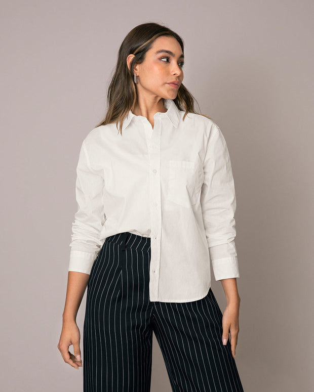 Blusa manga larga con botones funcionales en frente