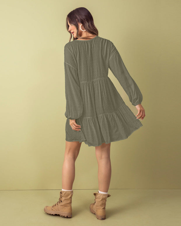 Vestido corto con volumen en mangas