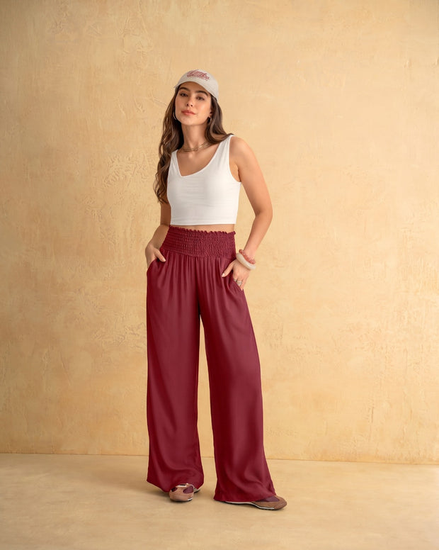 Pantalón bota ancha con nido de abeja en cintura