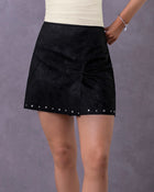 Falda corta elaborada en tela tipo gamuza#color_700-negro