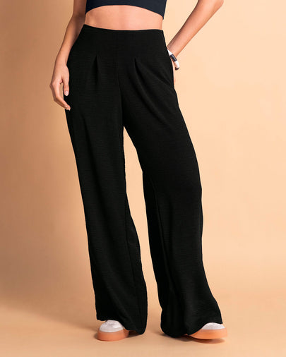 Pantalón bota ancha elaborado en tela con textura#color_700-negro