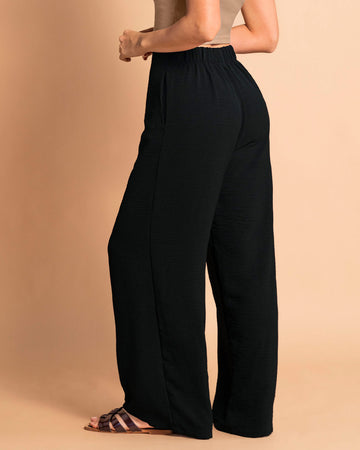 Pantalón bota ancha elaborado en tela con textura#color_700-negro