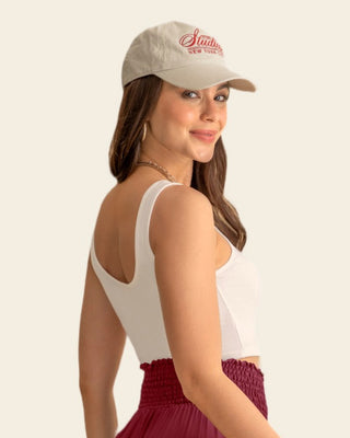 Crop top acanalado con escote asimétrico#color_018-marfil