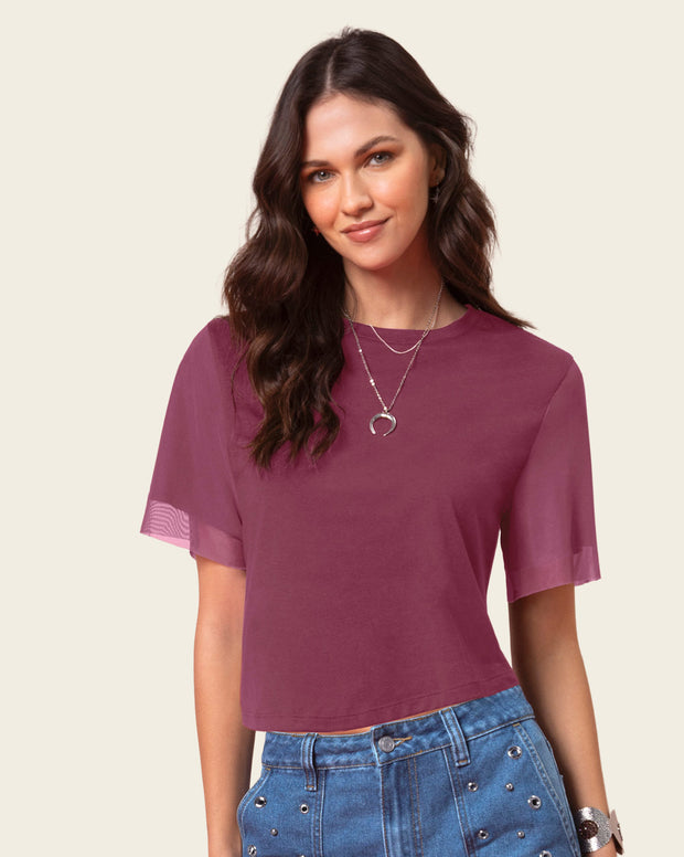 Camiseta cuello redondo con mangas en transparencia