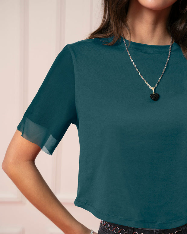 Camiseta cuello redondo con mangas en transparencia