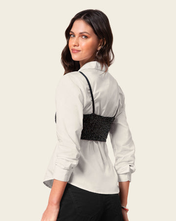 Camiseta crop top con lentejuelas#color_700-negro