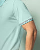 Camiseta tipo polo con elástico decorativo en puños#color_517-azul-claro
