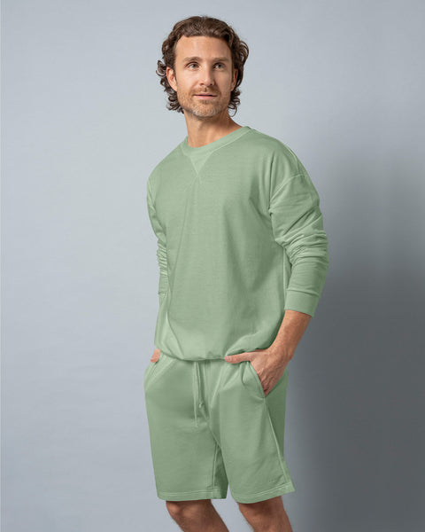 Buzo oversized con cuello redondo#color_600-verde-medio