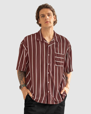 Camisa manga corta silueta oversized#color_a89-terracota