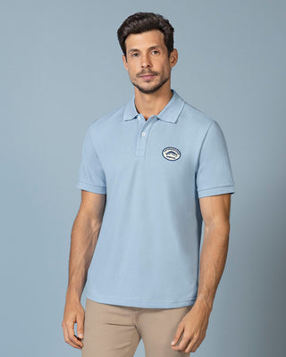 Camiseta tipo polo con aplique bordado#color_c67-azul