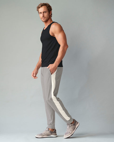 Pantalón jogger con bloque de color en los costados#color_783-gris-blanco