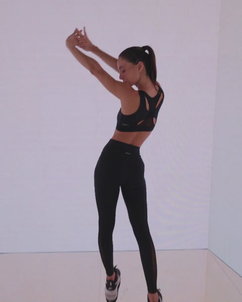 Legging deportivo con bolsillo lateral y detalles en tul#color_700-negro