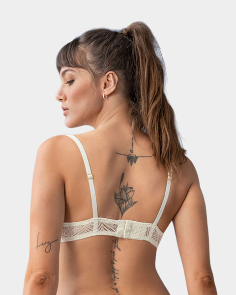 Bralette en encaje con transparencias y arco#color_253-marfil-crudo