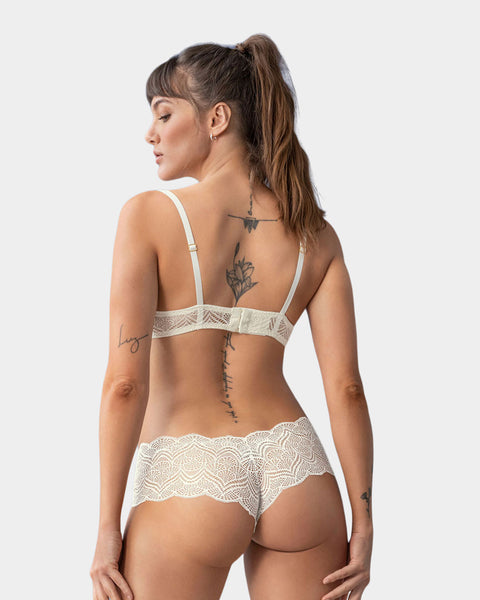 Bralette en encaje con transparencias y arco#color_253-marfil-crudo