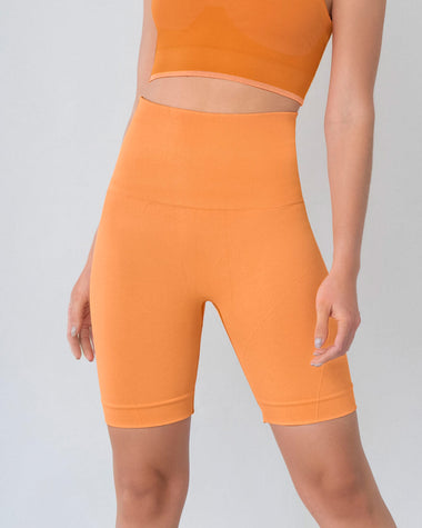 short-ciclista-sin-costuras-control-fuerte-en-abdomen-medio-y-moderado-en-muslos#color_203-naranja