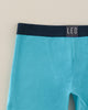 Paquete x 2 bóxer largo en algodón para niño#color_s09-fondo-verde-estampado-azul-claro