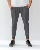 Jogger deportivo estilo sudadera con bolsillos laterales funcionales#color_755-gris-jaspe-oscuro