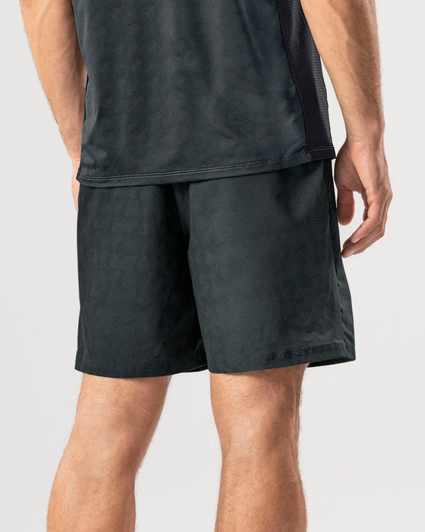 Pantaloneta deportiva con acabado antifluidos y bolsillos funcionales#color_798-estampado-ondas-gris