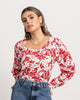 Camiseta manga larga con recogido en hombros y puños gruesos#color_145-flores-rojas