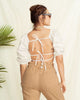 Blusa crop top con tiras para ajustar en espalda#color_018-marfil