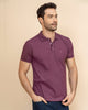 Camiseta tipo polo con bordado en frente#color_194-vino-pastel